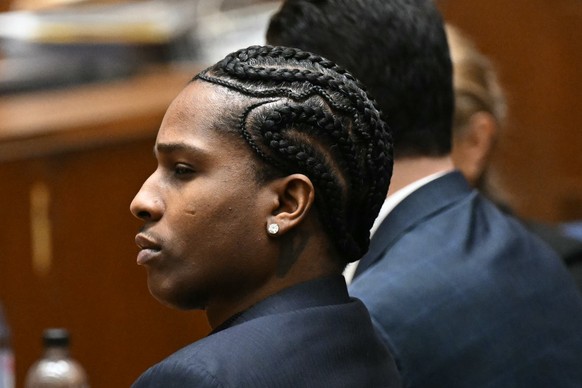 epa11897035 Rakim Mayers, aka A$AP Rocky, listens during closing arguments in the felony assault trial against him at the Clara Shortridge Foltz Criminal Justice Center in Los Angeles, California, USA ...