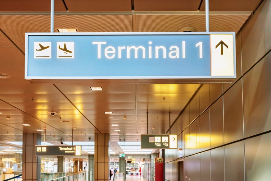 Close-up of the Terminal 1 sign at Hamburg Airport, Germany