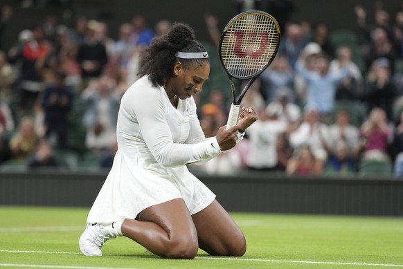 Serena Williams of the US celebrates after winning a point against France&#039;s Harmony Tan in a first round women&#039;s singles match on day two of the Wimbledon tennis championships in London, Tue ...