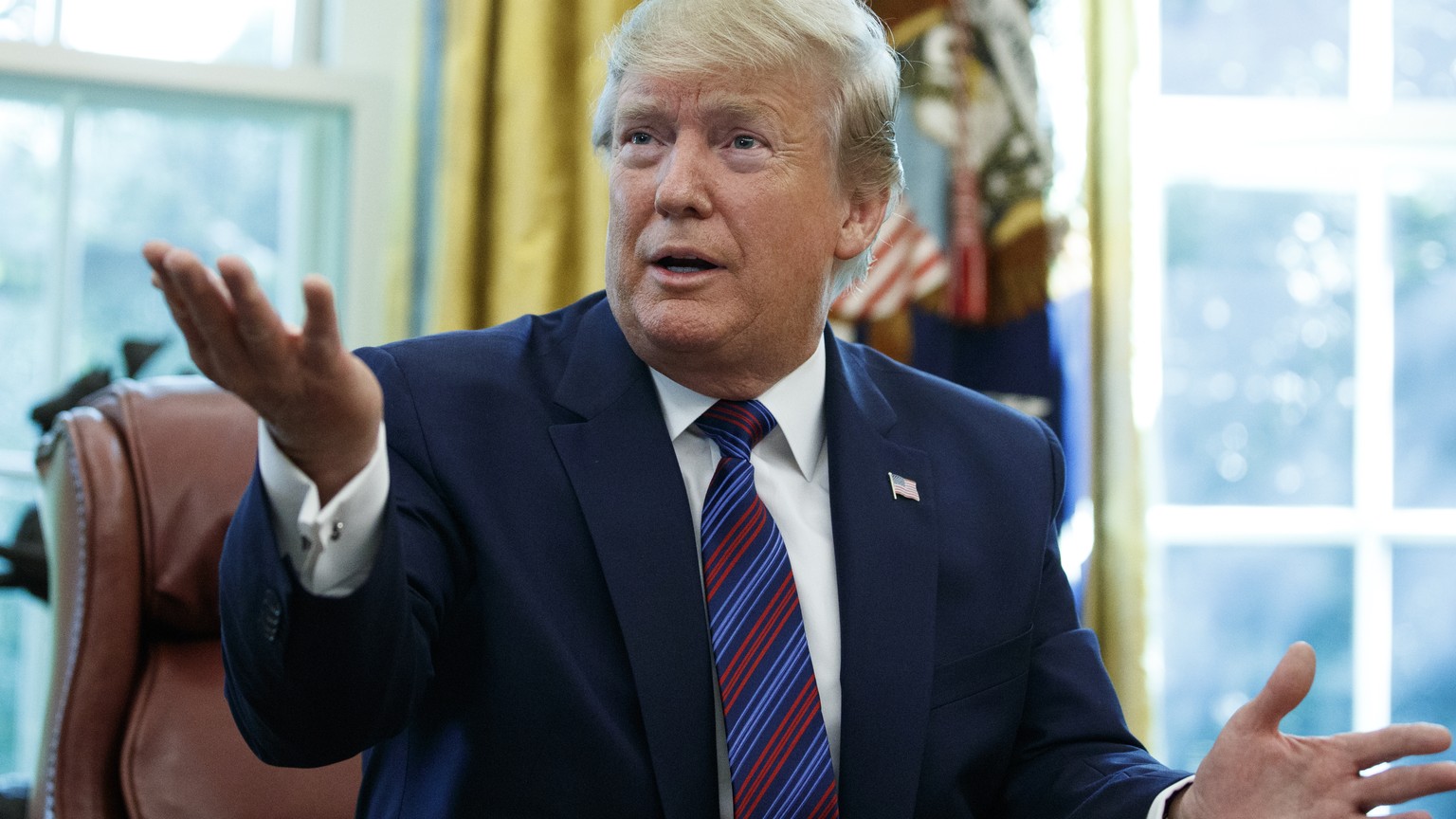 President Donald Trump speaks in the Oval Office of the White House in Washington, Friday, July 26, 2019. Trump announced that Guatemala is signing an agreement to restrict asylum applications to the  ...