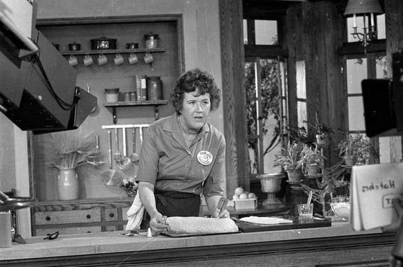 This Nov. 24, 1970 photo shows television cooking personality Julia Child preparing a French delicacy in her cooking studio. More so than the tools and techniques she popularized, Child's most lasting ...