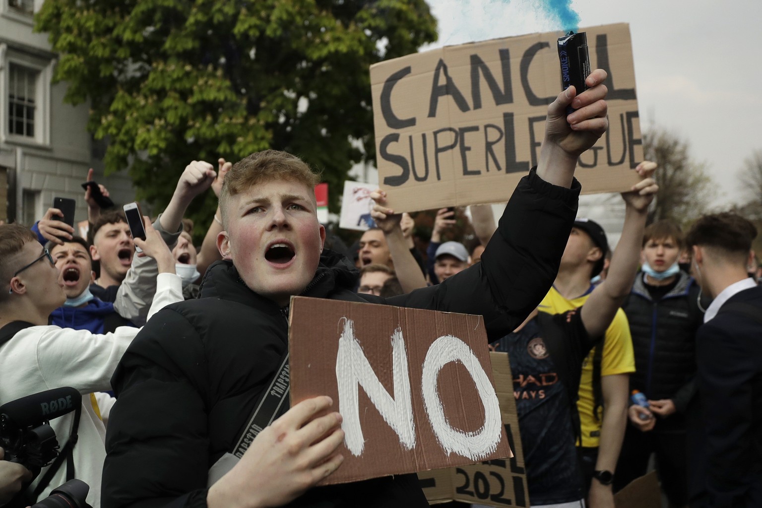 FILE - Chelsea fans protest outside Stamford Bridge stadium in London, against Chelsea&#039;s then decision to be included amongst the clubs attempting to form a new European Super League, Tuesday, Ap ...