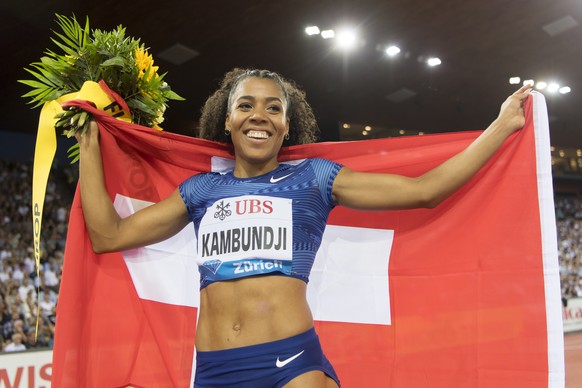 Mujinga Kambundji from Switzerland reacts after competing in the women&#039;s 200m race, during the Weltklasse IAAF Diamond League international athletics meeting in the stadium Letzigrund in Zurich,  ...