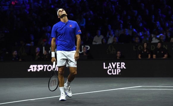 epa10202736 Team Europe Roger Federer of Switzerland reacts in his doubles match with Rafael Nadal (not pitured) of Spain against Team World double Jack Sock of the US and Frances Tiafoe of the US on  ...