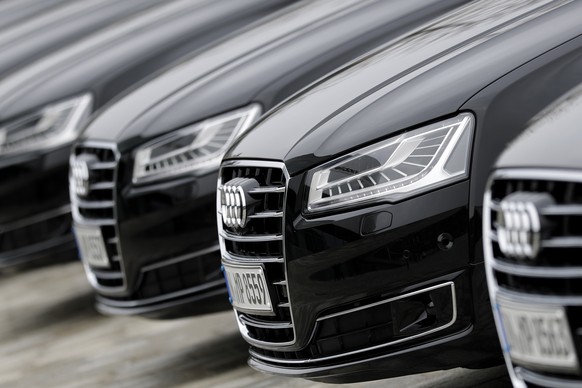 Cars of German car producer Audi are lined up outside the headquarters during the annual press conference in Ingolstadt, Germany, Wednesday, March 15, 2017. German media report that authorities are se ...