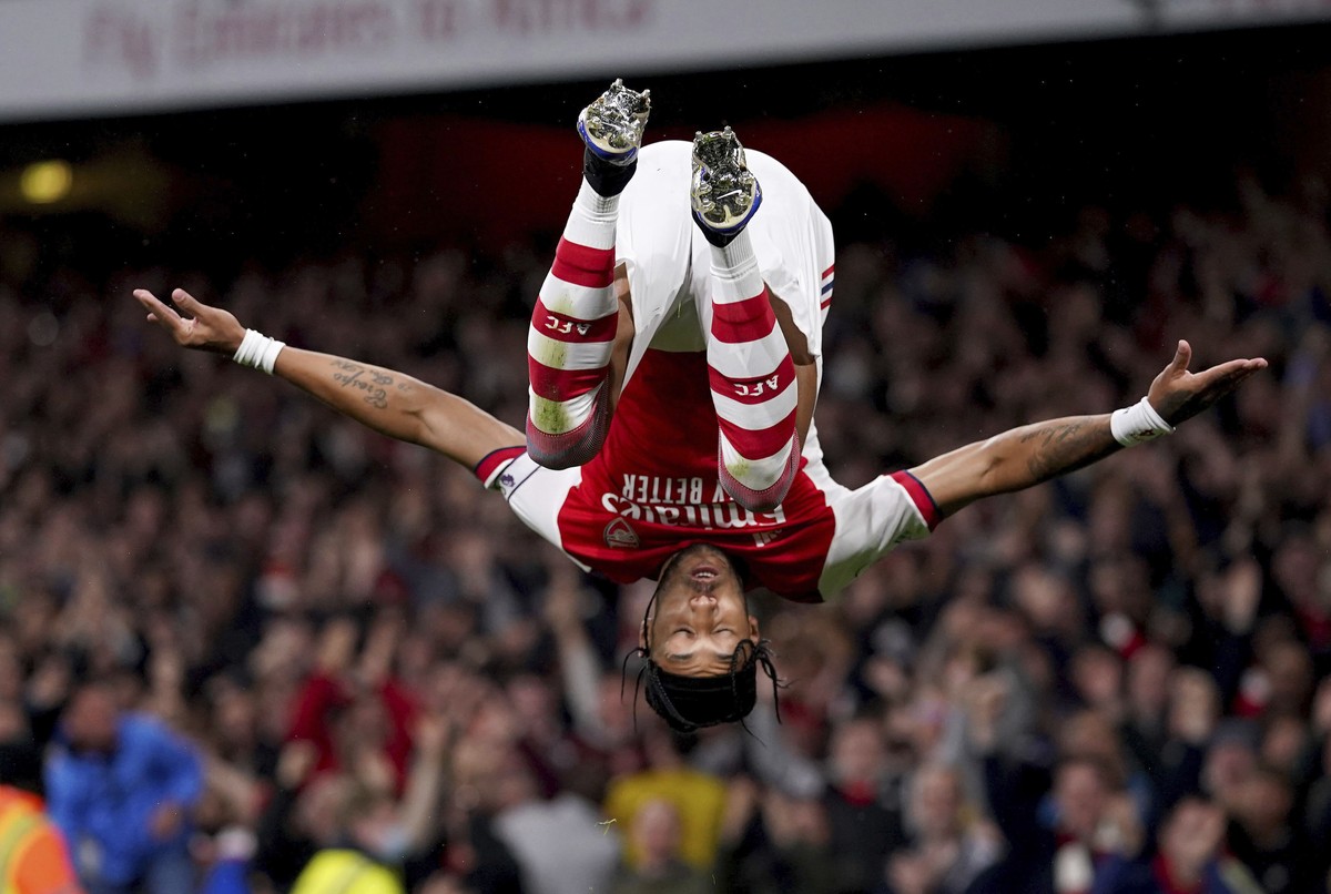Arsenal's Pierre-Emerick Aubameyang celebrates after scoring the opening goal during the English Premier League soccer match between Arsenal and Crystal Palace at the Emirates Stadium in London,  ...
