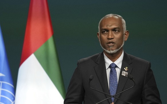 FILE - Maldives President Mohamed Muizzu speaks during a plenary session at the COP28 U.N. Climate Summit, Dec. 1, 2023, in Dubai, United Arab Emirates. India says it has started pulling out dozens of ...
