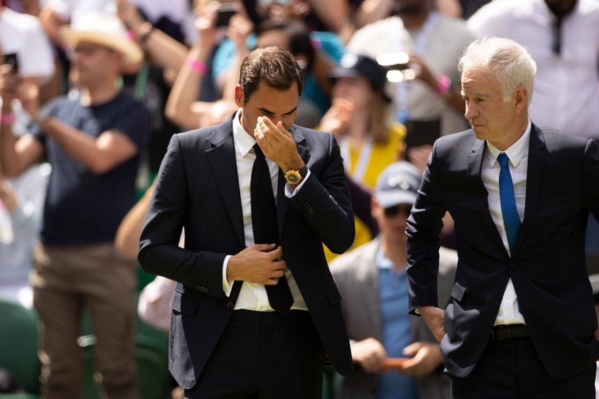 Mandatory Credit: Photo by Ella Ling/Shutterstock 13012853ba Roger Federer sheds a tear on Centre Court as part of the centenary celebrations Wimbledon Tennis Championships, Day 7, The All England Law ...