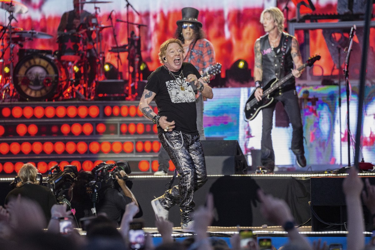 Axl Rose, center, Slash, back left and Duff McKagan, back right of Guns N' Roses perform during the Glastonbury Festival in Worthy Farm, Somerset, England, Saturday, June 24, 2023. (Joel C Ryan/I ...