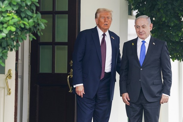 epa12414923 US President Donald Trump (L) greets Prime Minister of Israel Benjamin Netanyahu (R) as he arrives at the West Wing of the White House in Washington, DC, USA, 29 September 2025. President  ...