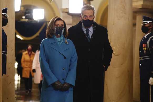 Speaker of the House Nancy Pelosi (D-Calif.) and her husband Paul Pelosi arrive in the Crypt of the US Capitol for President-elect Joe Biden&#039;s inauguration ceremony on Wednesday, Jan. 20, 2021 in ...