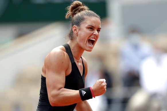 epa09257369 Maria Sakkari of Greece reacts during her quarter final match against Iga Swiatek of Poland at the French Open tennis tournament at Roland Garros in Paris, France, 09 June 2021. EPA/IAN LA ...