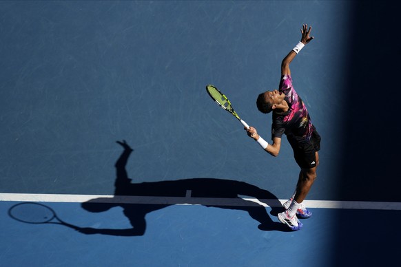 Felix Auger-Aliassime of Canada serves to Francisco Cerundolo of Argentina during their third round match at the Australian Open tennis championship in Melbourne, Australia, Friday, Jan. 20, 2023. (AP ...