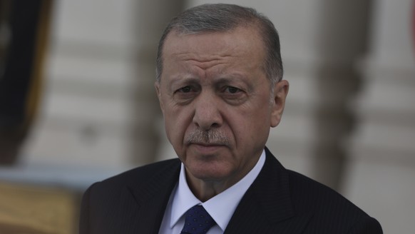 Turkish President Recep Tayyip Erdogan arrives for an official welcome ceremony, in Ankara, Turkey, Wednesday, June 8, 2022. Erdogan on Thursday warned Greece to demilitarize islands in the Aegean, sa ...