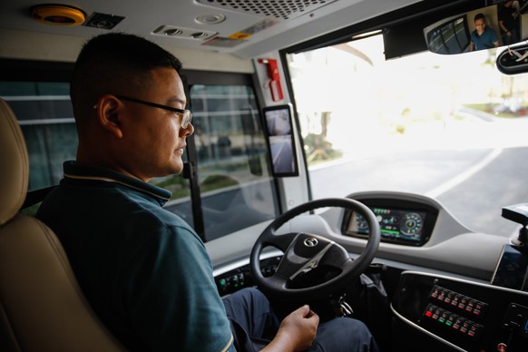 epa10842269 A member staff tests a driverless car at the Intelligent Connected Vehicle Innovation Center of Western Science City and Academician Li Keqiang Workstation in Chongqing city, China, 05 Sep ...