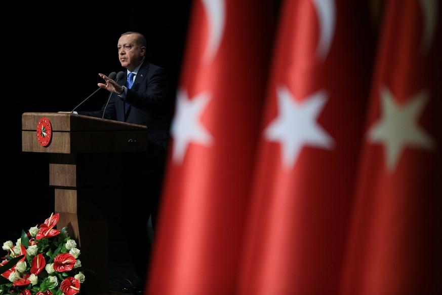 epa06464667 A handout photo made available by the Turkish Presidential Press Office shows Turkish President Recep Tayyip Erdogan speaking during the Ankara Chamber of Industry award ceremony in Ankara ...