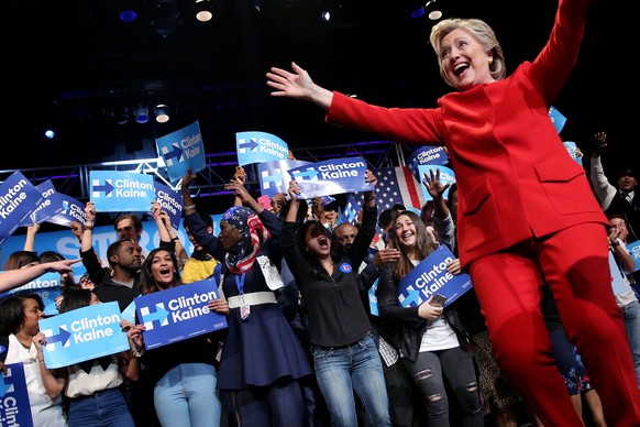 U.S. Democratic presidential candidate Hillary Clinton reacts as she arrive to meet with campaign supporters after the first presidential debate with Republican presidential nominee Donald Trump, in W ...