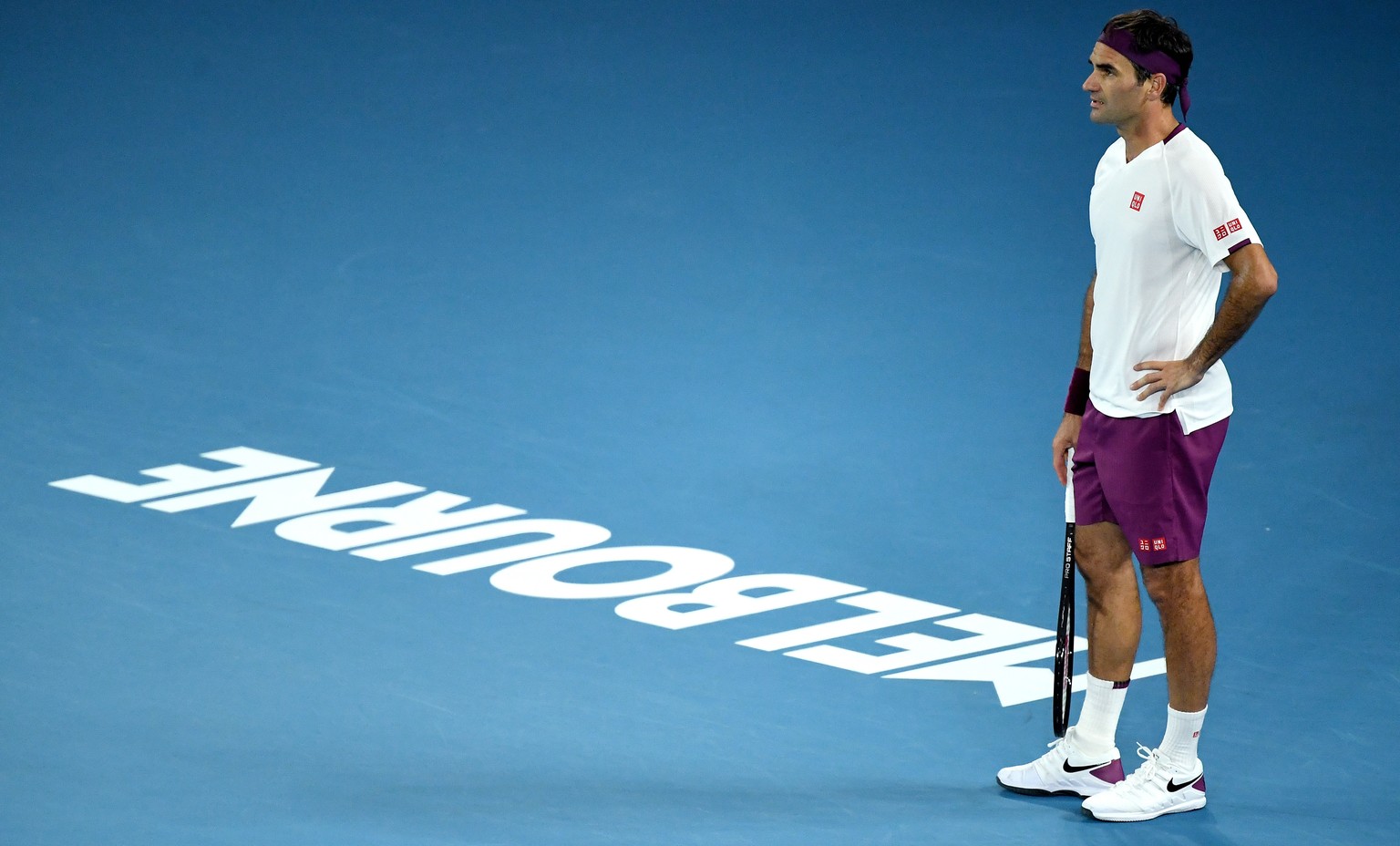 epa08166406 Roger Federer of Switzerland in action during his fourth round match against Marton Fucsovics of Hungary on day seven of the Australian Open tennis tournament at Melbourne Park in Melbourn ...