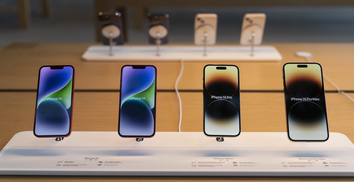 The new iPhone 14 smartphones are on display at an Apple Store at The Grove in Los Angeles, Friday, Sept. 16, 2022. Apple's iPhone 14 lineup and Apple Watch Series 8 are available to purchase in- ...