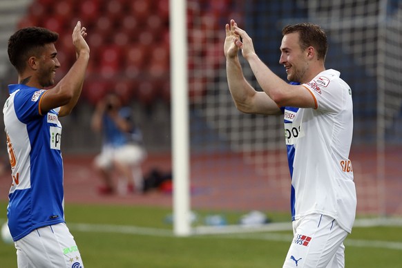 Grasshopper Club Zuerich midfielder Runar Mar Sigurjonsson, right, celebrates with his teammates Nikola Gjorgjev after scoring his second goal to the score of 2-1 during the UEFA Europa League second  ...