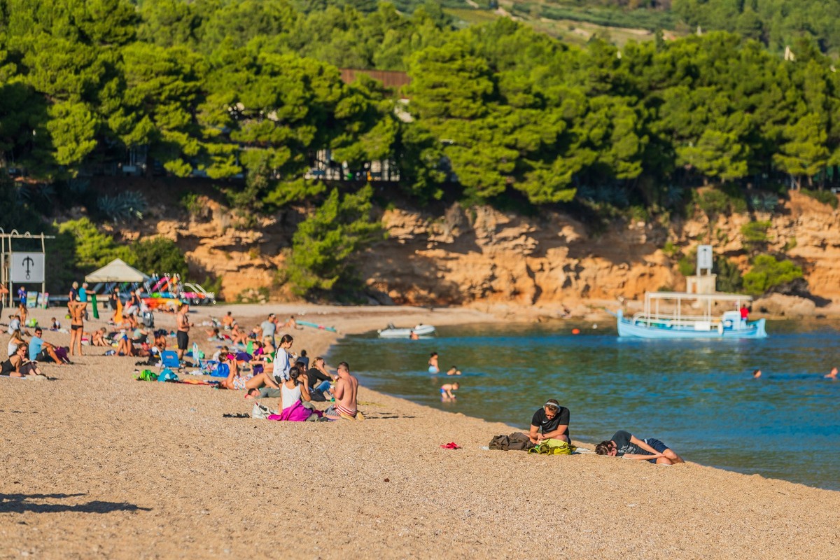 Croartia Zlatni Rat Beach Tourists are seen on a beach known as the Zlatni rat Golden Horn near Bol at the Croatian Adriatic island of Brac, some 60 km from Split, Croatia on October 30, 2024. PUBLICA ...