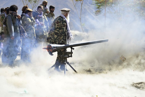 Militiamen loyal to Ahmad Massoud, son of the late Ahmad Shah Massoud, take part in a training exercise, in Panjshir province, northeastern Afghanistan, Monday, Aug. 30, 2021. The Panjshir Valley is t ...