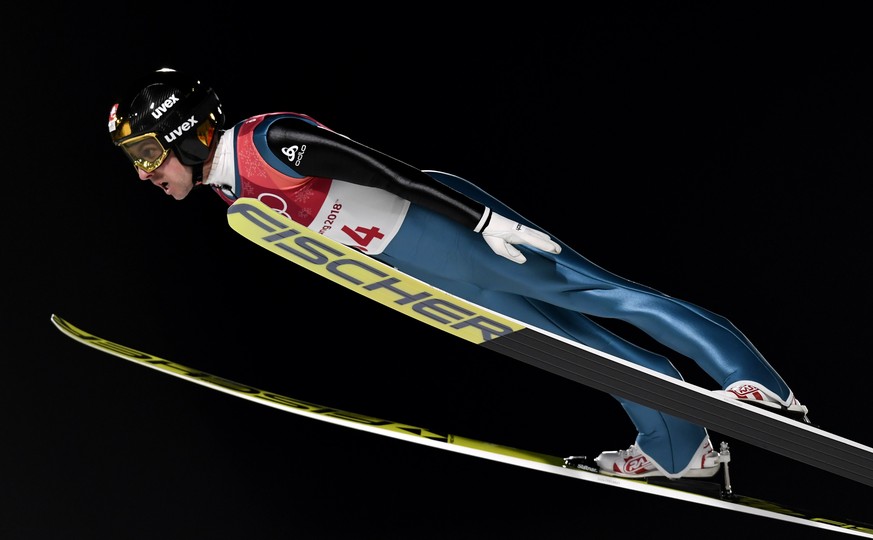 epa06536332 Simon Ammann of Switzerland is airborne during the Men&#039;s Large Hill Individual Ski Jumping competition at the Alpensia Ski Jumping Centre during the PyeongChang 2018 Olympic Games, So ...