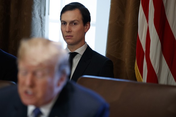 FILE - In this Nov. 1, 2017 file photo, White House senior adviser Jared Kushner listens as President Donald Trump speaks during a cabinet meeting at the White House, in Washington. Trump took office  ...