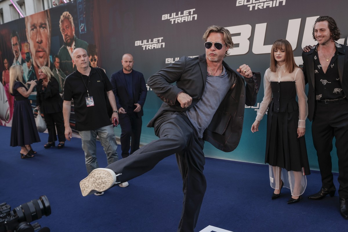 Brad Pitt jokes with camera operators as he arrives for the premiere of the film 'Bullet Train' in Paris, Monday, July 18, 2022. (AP Photo/Lewis Joly)
Brad Pitt