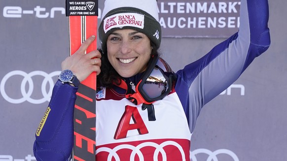 First placed Italy's Federica Brignone celebrates at the end of an alpine ski, women's World Cup Women's Alpine Combined, in Altenmarkt-Zauchensee, Austria, Sunday, Jan. 12, 2020. (AP P ...