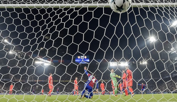 Basel&#039;s Mohamed Elyounoussi, center, celebrates the first score to 1:0 during an UEFA Champions League Group stage Group A matchday 4 soccer match between Switzerland&#039;s FC Basel 1893 and Rus ...