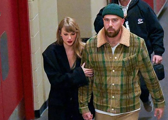 December 19, 2023: Taylor Swift and Travis Kelce leave after the Buffalo Bills defeated the Kansas City Chiefs, 20-17, on Dec. 10, 2023, at GEHA Field at Arrowhead Stadium in Kansas City, Missouri. -  ...