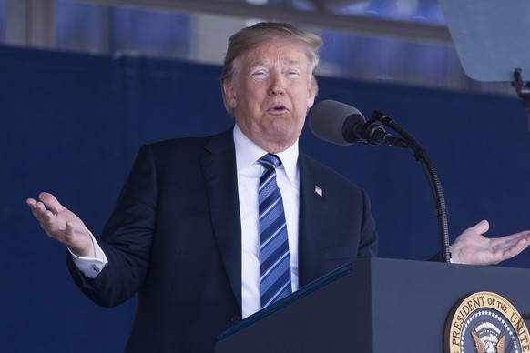 epa06763008 US President Donald J. Trump delivers remarks during the United States Naval Academy Graduation and Commissioning Ceremony, at Navy-Marine Corps Memorial Stadium in Annapolis, Maryland, US ...