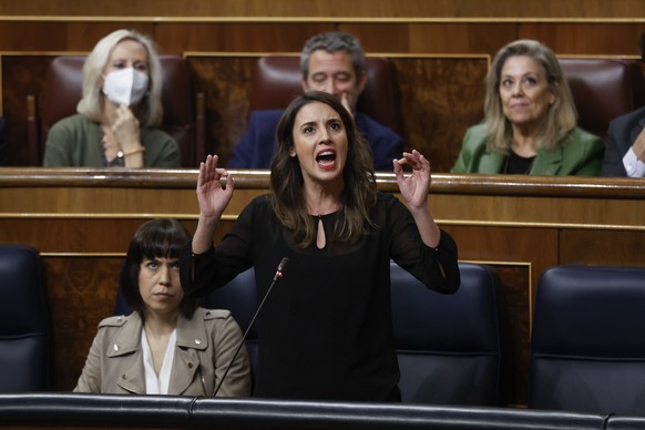 epa10338221 Spanish Equality Minister, Irene Montero, during question time at the Lower House in Madrid, Spain, 30 November 2022, amid criticism against the &#039;Only yes is yes&#039; law that came i ...