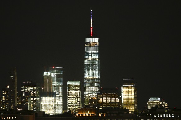 One World Trade Center is shown Tuesday, March 22, 2016, in New York. New York Gov. Andrew Cuomo has directed One World Trade Center be displayed in the Belgium colors of black, yellow and red to show ...