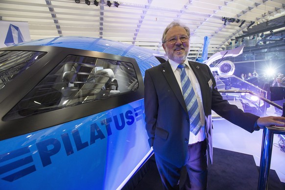 JAHRESRUECKBLICK 2013 - MAI - Oscar J. Schwenk, CEO of Pilatus, poses for the photographers in front of a 1:1 model of the new aircraft Pilatus PC-24 Twin-Jet after its unveiling, during the 13th Annu ...