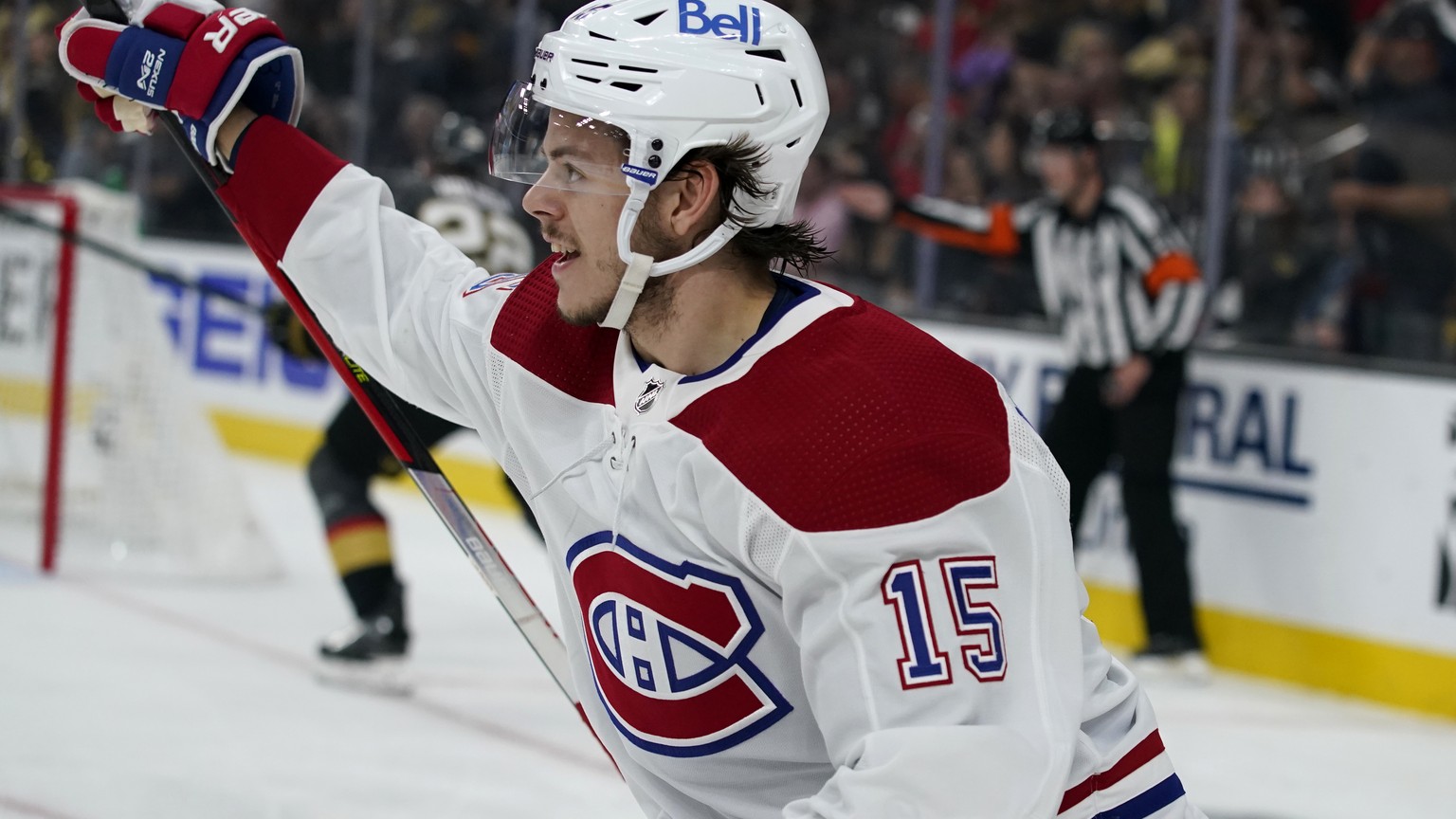 FILE - In this June 22, 2021, file photo, Montreal Canadiens center Jesperi Kotkaniemi (15) celebrates his goal against the Vegas Golden Knights during the first period in Game 5 of an NHL hockey Stan ...