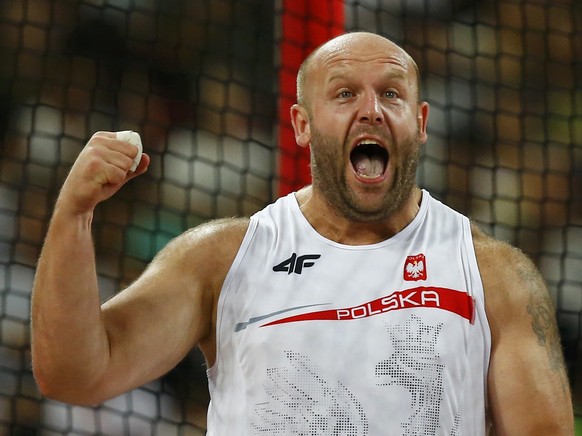 Piotr Malachowski of Poland reacts during the men's discus throw final at the 15th IAAF World Championships at the National Stadium in Beijing, China, August 29, 2015. REUTERS/Kai Pfaffenbach TPX IMAG ...