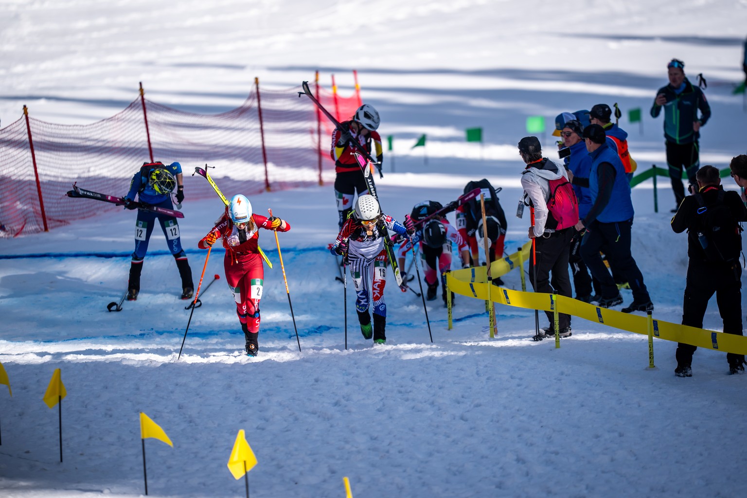 Marianne Fatton of Switzerland, 1st, 2 left, in action during the Sprint race at the ISMF Ski Mountaineering World Championships, in Morgins, Switzerland, Thursday, March 6, 2025. (KEYSTONE/Maxime Sch ...