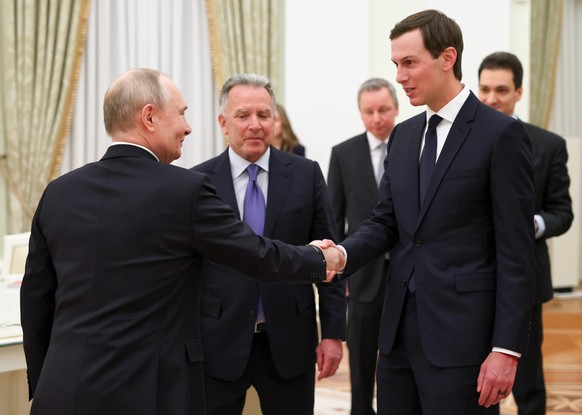 KEYPIX - Russian President Vladimir Putin, left, greets U.S. President Donald Trump's envoys Steve Witkoff, center, and Jared Kushner at the Senate Palace of the Kremlin, in Moscow, Thursday, Jan ...