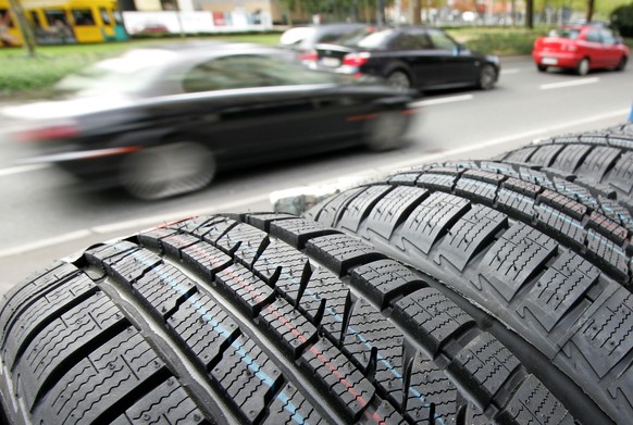 A photo of winter tires taken on Wednesday (October 6, 2010) at a car repair shop in Frankfurt am Main.  Federal Transport Minister Peter Ramsauer (CSU) wants winter tires to be mandatory in snow and ice...