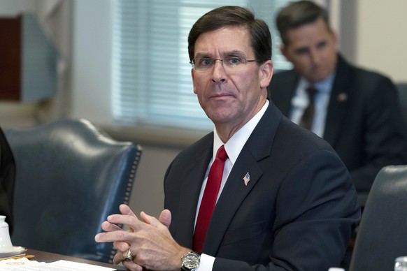 FILE - In this Sept. 22, 2020, file photo, Secretary of Defense Mark Esper speaks before a meeting with Israeli Defense Minister Benny Gantz, at the Pentagon in Washington. In a lawsuit filed against  ...