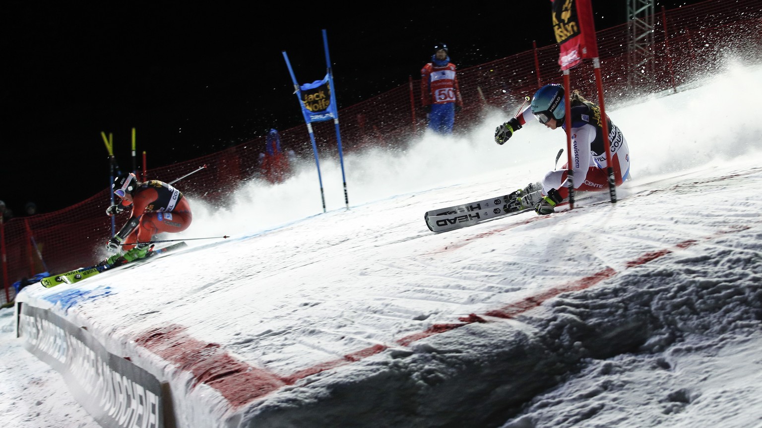 Norway&#039;s Maren Skjoeld, left, and Switzerland&#039;s Wendy Holdener compete during an alpine ski, women&#039;s World Cup parallel slalom in Courchevel, France, Wednesday, Dec. 20, 2017. (AP Photo ...