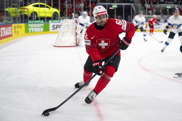 Switzerland's Denis Malgin in action during the 2026 IIHF Men's Ice Hockey World Championship preliminary round group A game between Switzerland and Finland, at the Swiss Life Arena ice hock ...