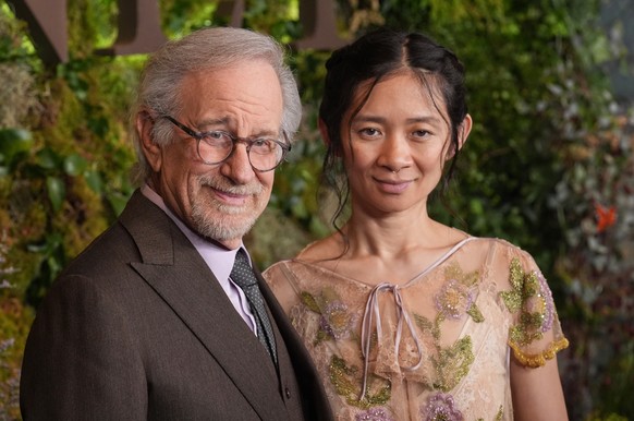 Steven Spielberg, left, the producer of "Hamnet," poses with director and co-writer Chloe Zhao at the premiere of the film on Tuesday, Nov. 18, 2025, at the Academy Museum of Motion Pictures ...