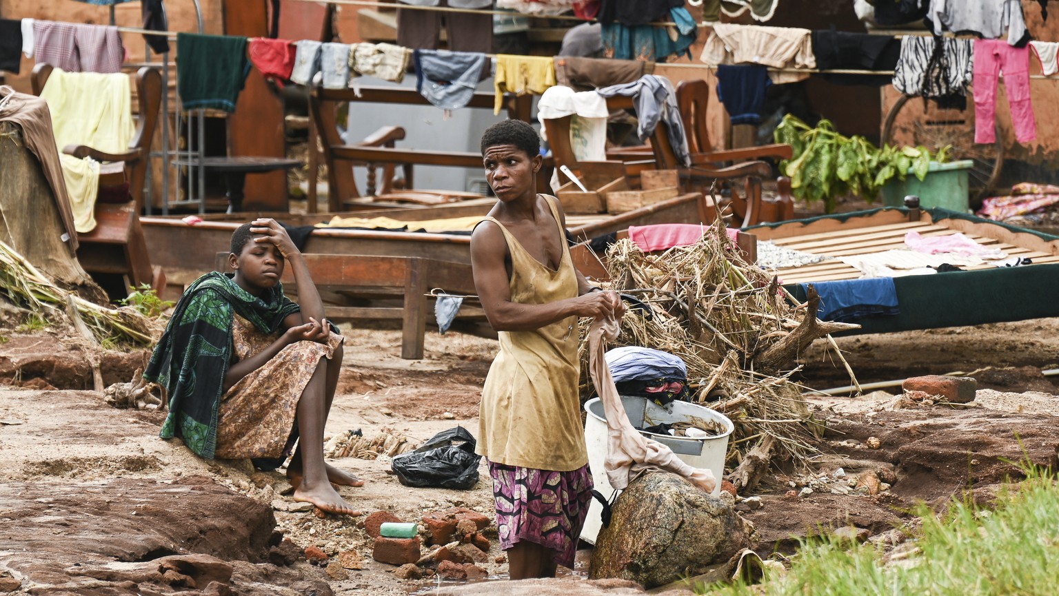 Clothes are hung out to dry on called electrical power lines caused by last week&#039;s heavy rains caused by Tropical Cyclone Freddy in Phalombe, southern Malawi Saturday, March 18, 2023. (AP Photo/T ...