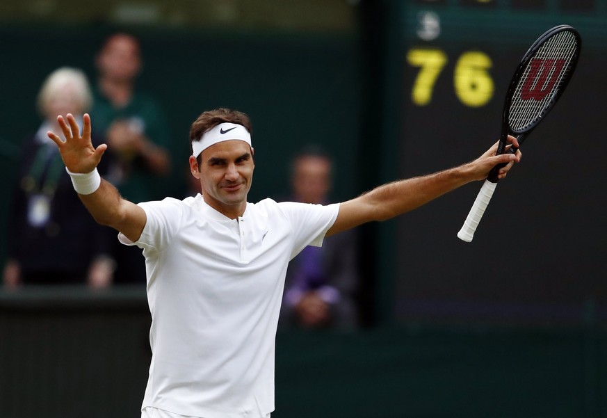 epa06076984 Roger Federer of Switzerland celebrates his win over Mischa Zverev of Germany in their third round match during the Wimbledon Championships at the All England Lawn Tennis Club, in London,  ...