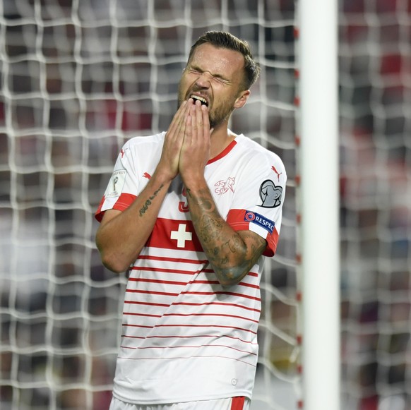 Switzerland&#039;s Haris Seferovic reacts after missing a shot during the 2018 Fifa World Cup Russia group B qualification soccer match between Portugal and Switzerland at the Estadio da Luz stadium,  ...