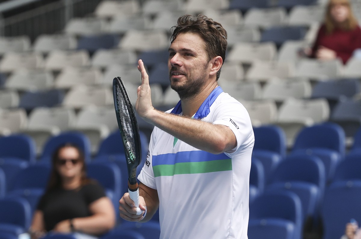 Switzerland's Stan Wawrinka reacts after defeating Portugal's Pedro Sousa in their first round match at the Australian Open tennis championship in Melbourne, Australia, Monday, Feb. 8, 2021. ...