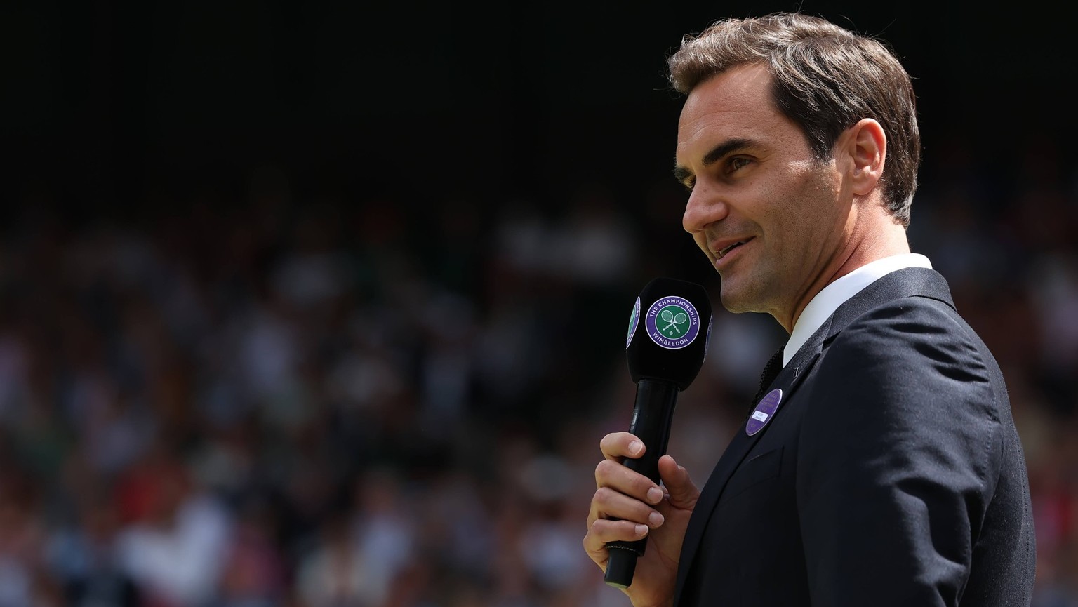 3rd July 2022, All England Lawn Tennis and Croquet Club, London, England Wimbledon Tennis tournament Roger Federer speaks on the microphone at centre court for the 100 year celebration PUBLICATIONxNOT ...